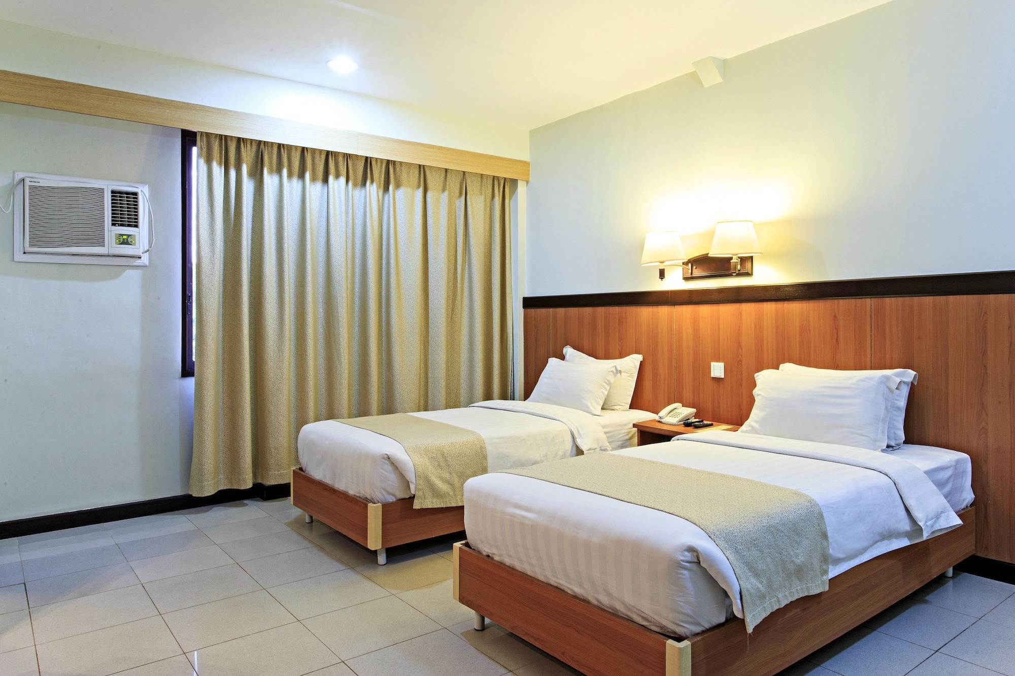 מנדאוה סיטי The Orchard Cebu Hotel & Suites Powered By Cocotel מראה חיצוני תמונה