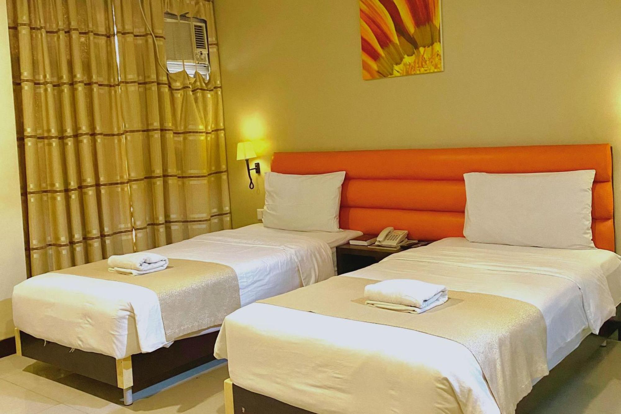 מנדאוה סיטי The Orchard Cebu Hotel & Suites Powered By Cocotel מראה חיצוני תמונה