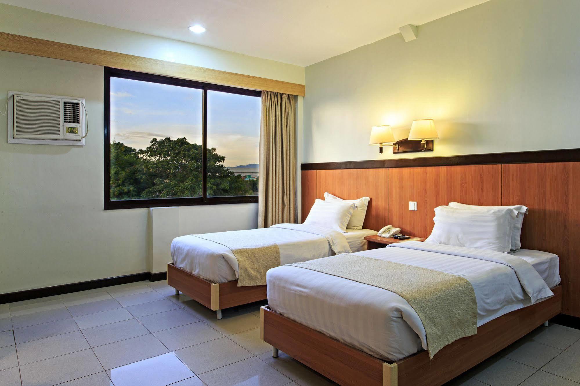מנדאוה סיטי The Orchard Cebu Hotel & Suites Powered By Cocotel מראה חיצוני תמונה